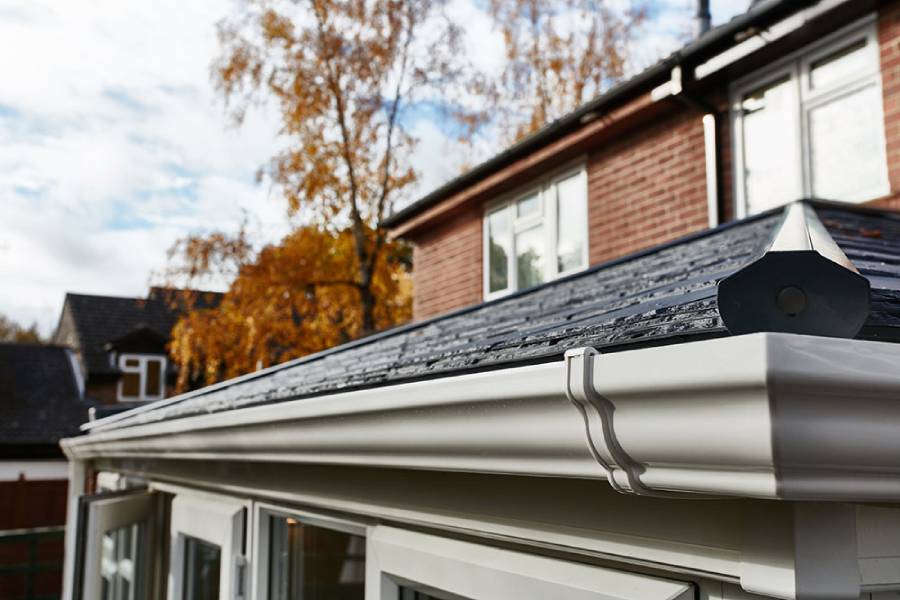 Solid roof conservatory replica slate tiled roof close up