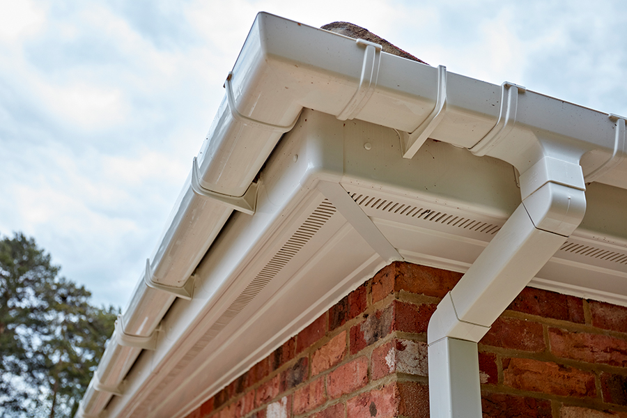White uPVC guttering corner close up