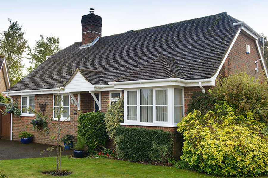 White uPVC guttering downpipes whole house